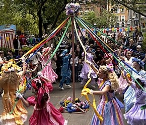 The traditional May Day maypole dance